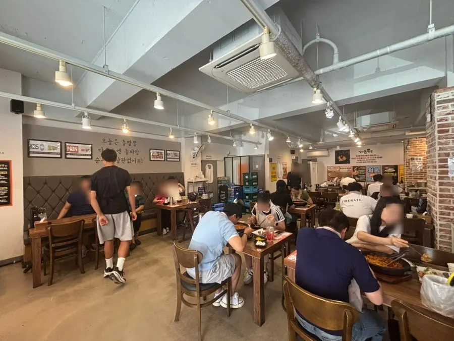 Interior of Milyang Dol Jjamppong with many tables