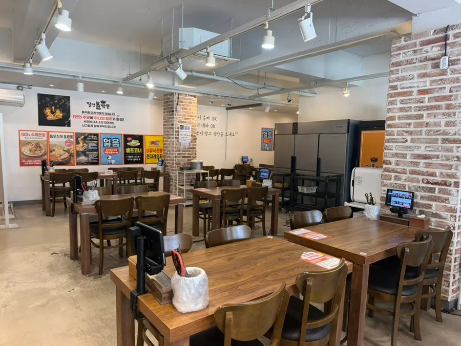 Dining hall with generous spacing between tables