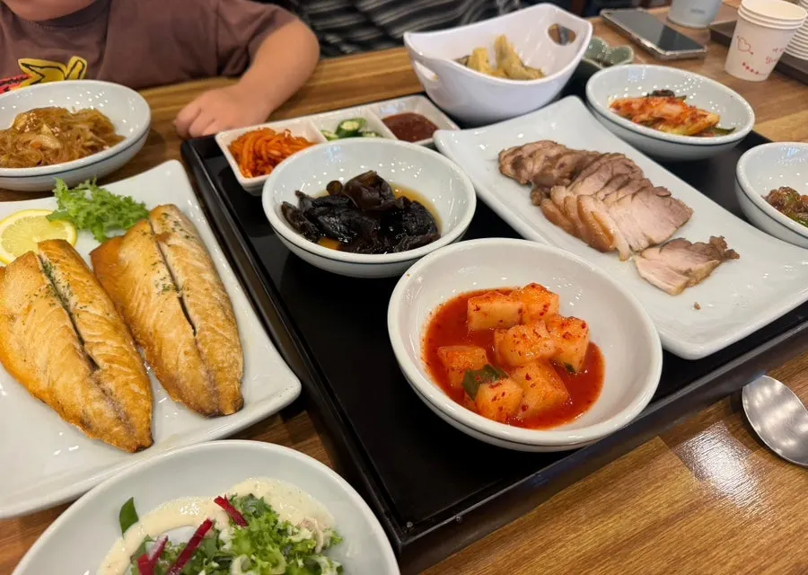 Table set with steamed pork and side dishes