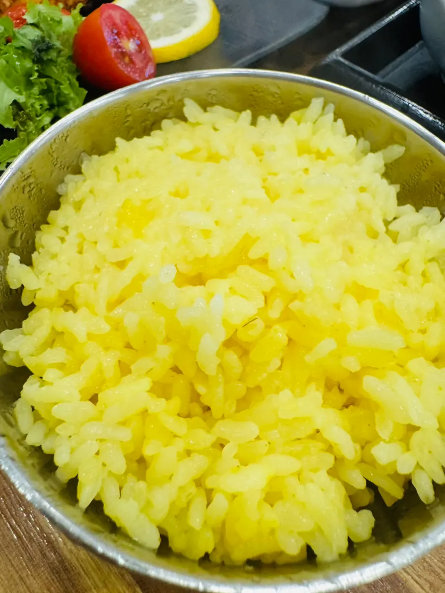 A bowl of golden turmeric rice