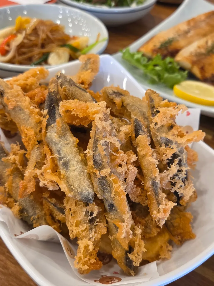 Grilled mackerel with golden-browned skin