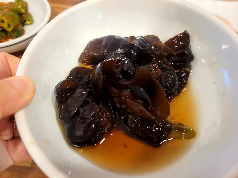 A full spread of basic side dishes at Ilpum Irojeong