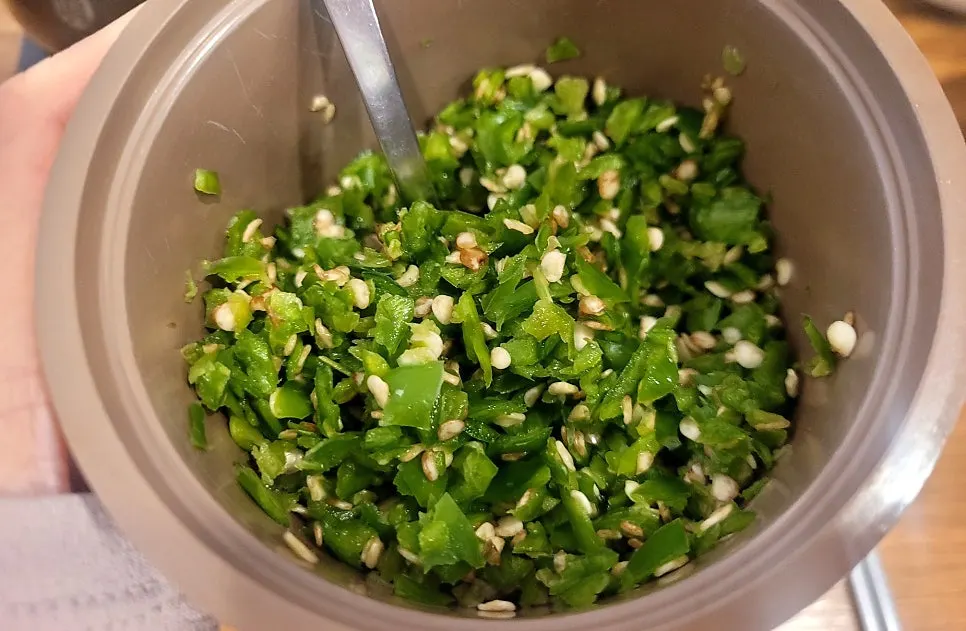Loach soup with minced chili and minced garlic added