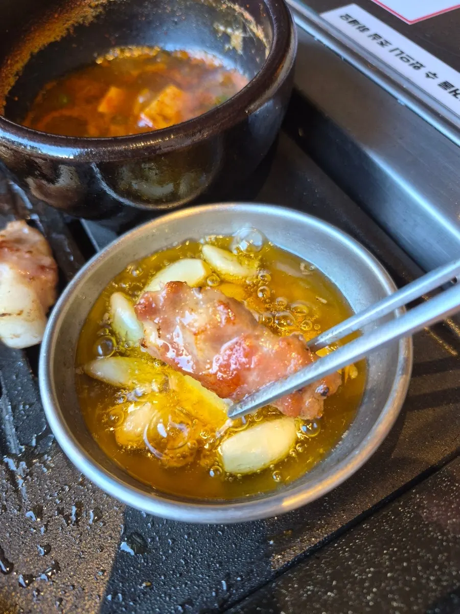 Salted shrimp turning golden as it cooks in the oil