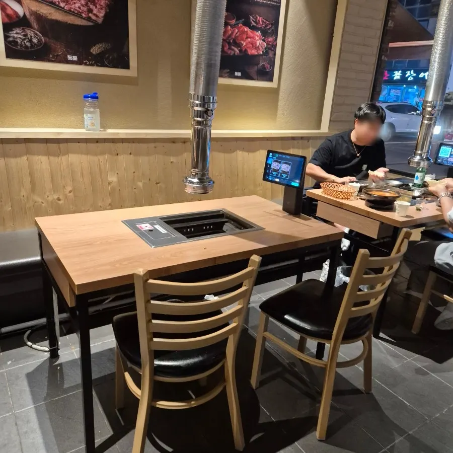 Interior table seating at Dotdot Milyang Main Branch