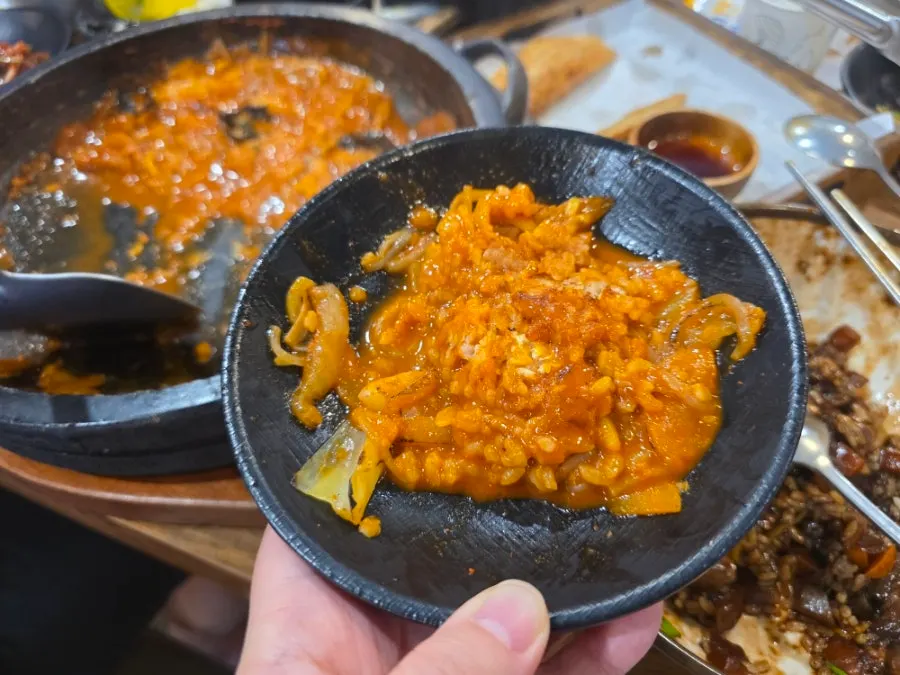 Jjamppong noodles and seafood sizzling on the stone plate