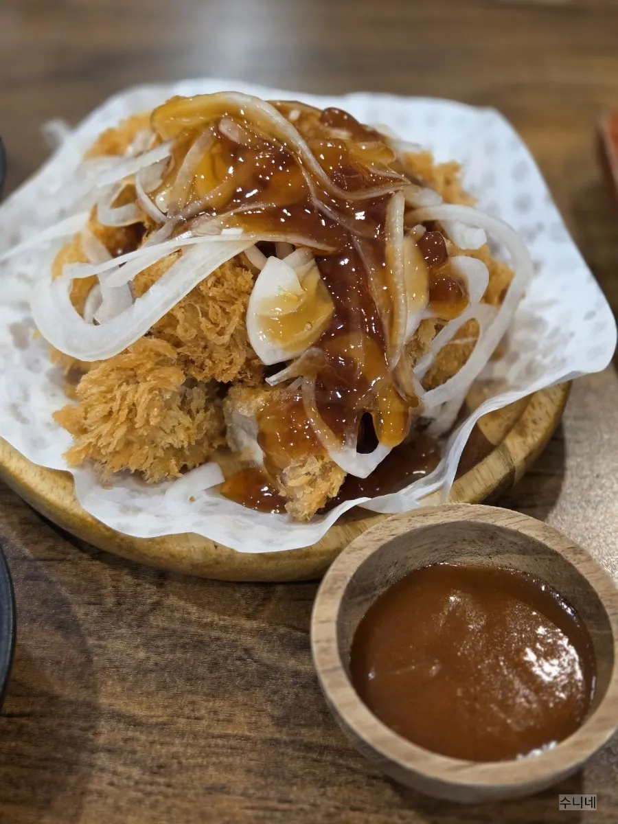 Homemade donttang served with sauce drizzled on top