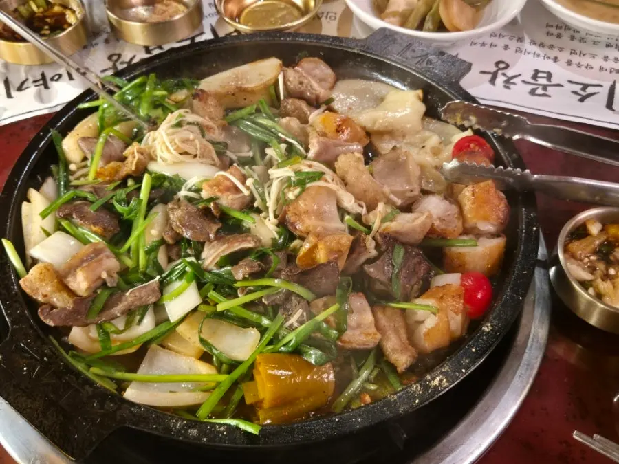 Beef gopchang cooking on the grill
