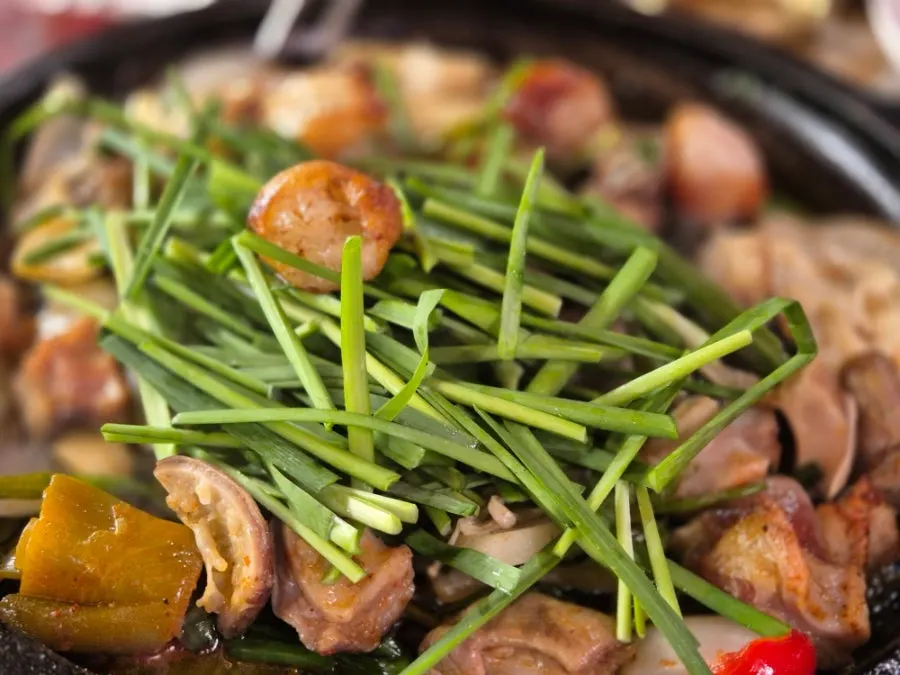 Seasoned chives served alongside the marchang