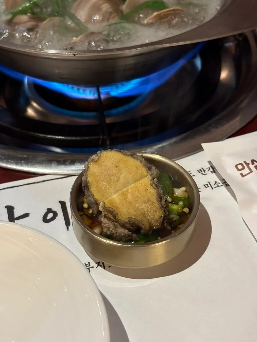 Clam soup with abalone cut into easy-to-eat pieces