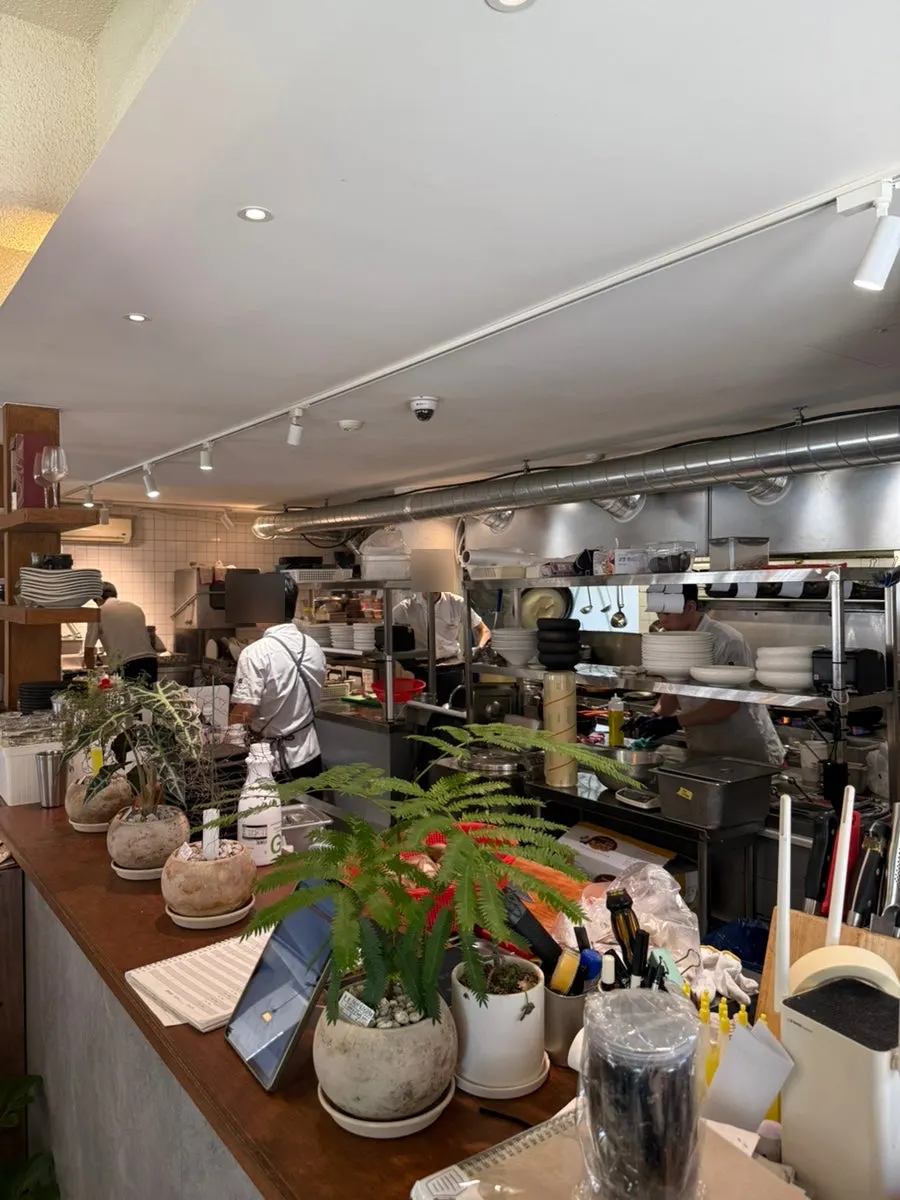 Open kitchen at Moa Gangnam with cooking visible
