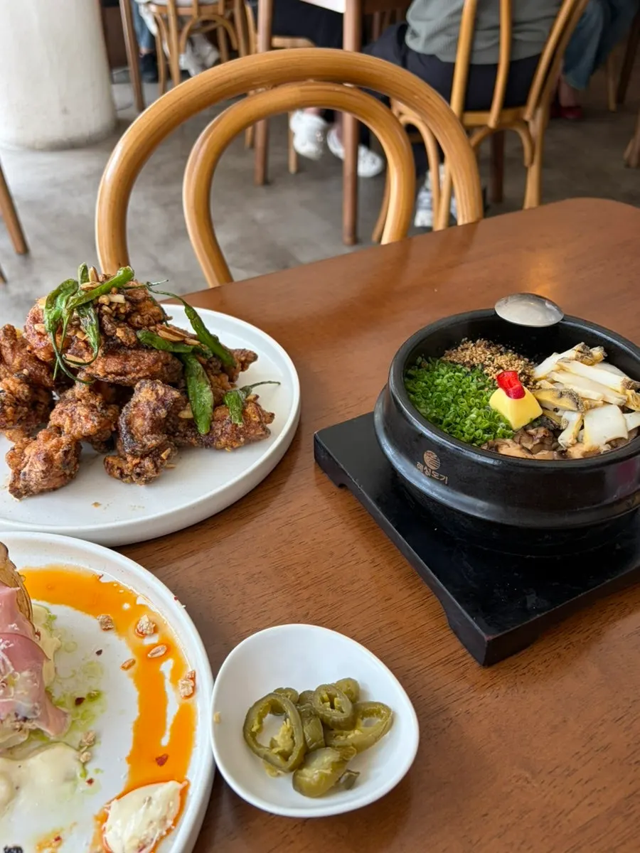 Table spread of three dishes ordered for two people