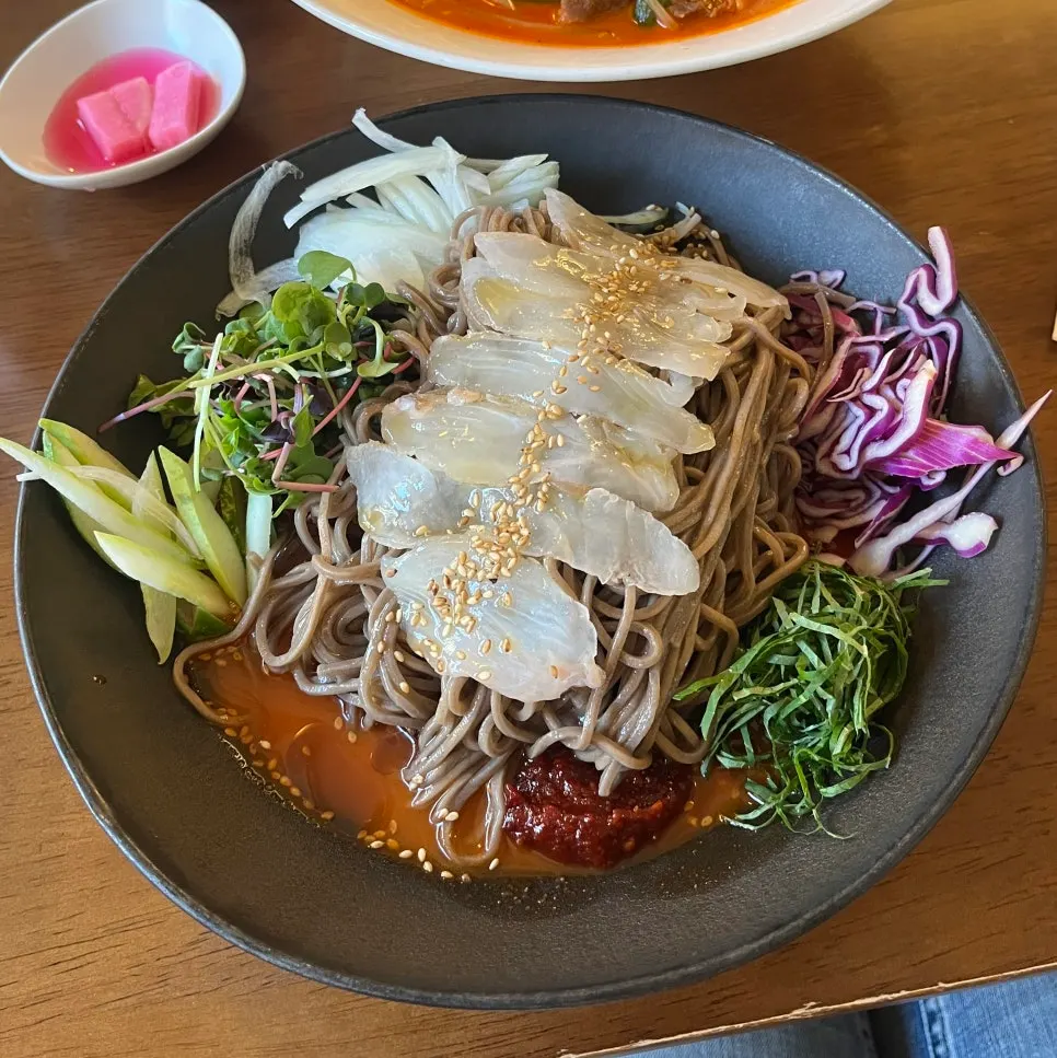 A plate of spicy buckwheat noodles with flounder