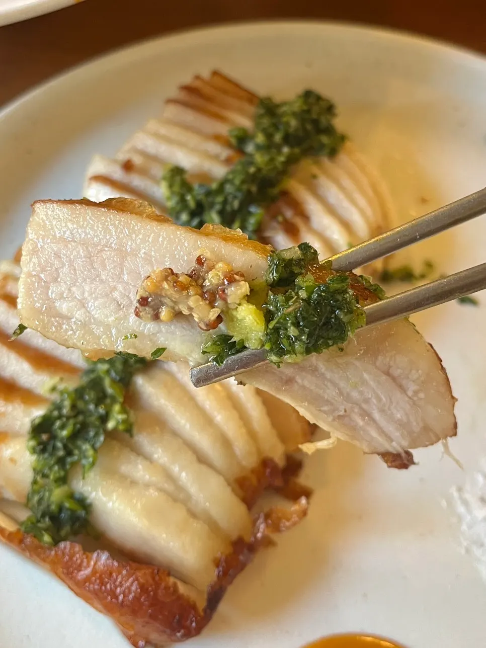 Pork jowl served with wholegrain mustard