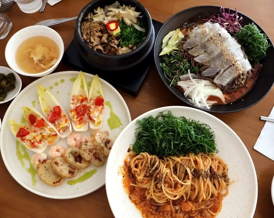 Table spread with all four dishes