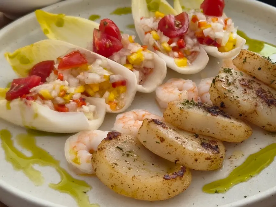 Endive bite topped with shrimp