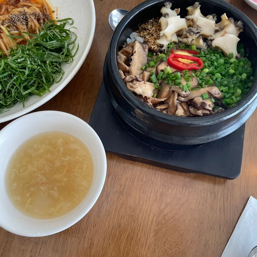 Egg drop soup served alongside the pot rice