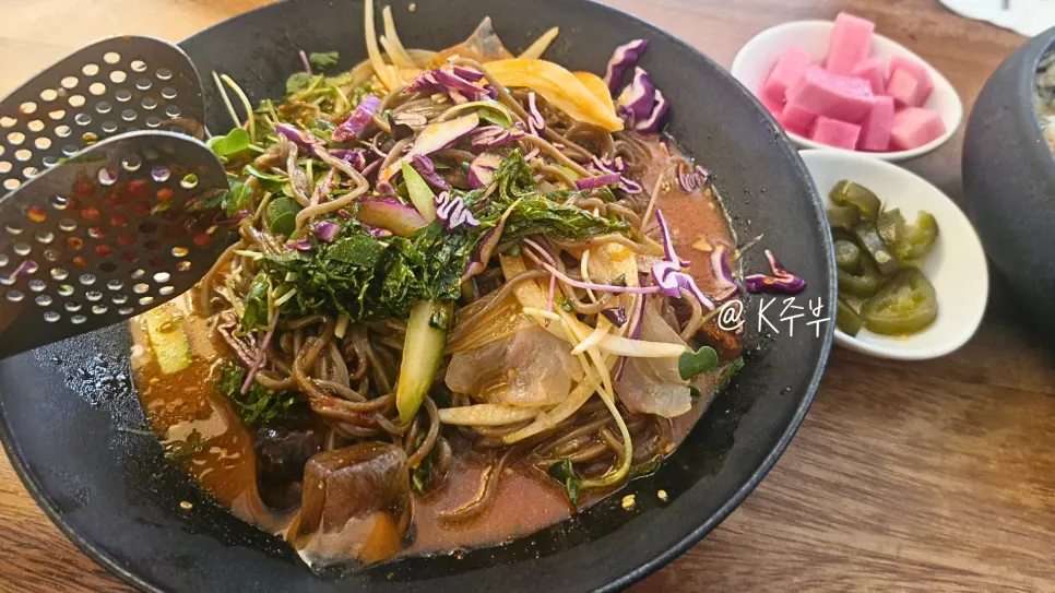 Vividly colored spicy buckwheat noodles with flounder