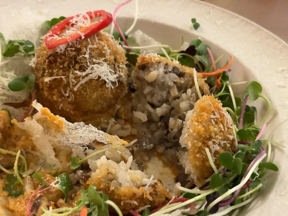 Close-up of the arancini's inside showing bulgogi filling