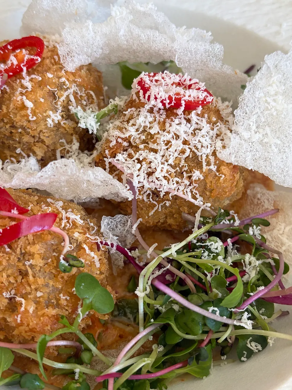 A plate of Moa Gangnam's barley doenjang arancini