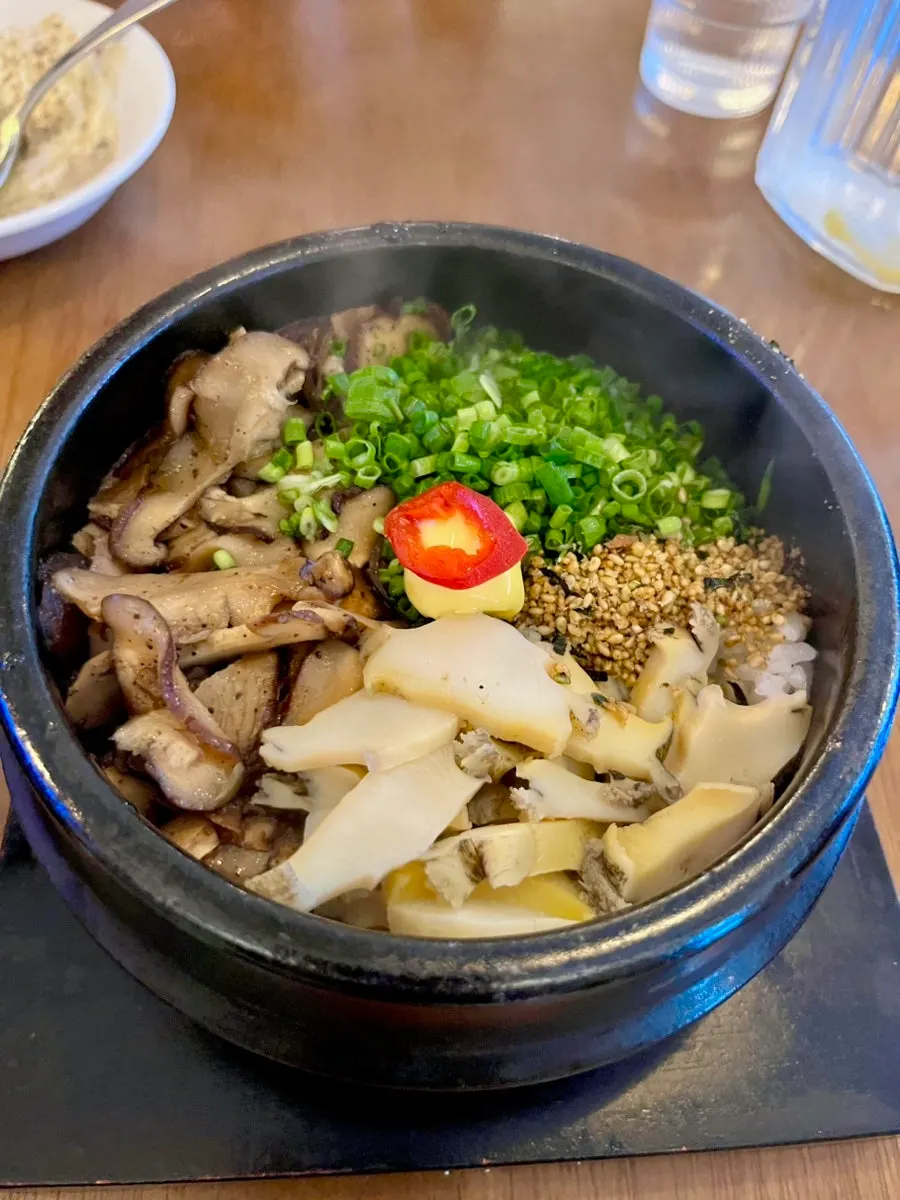 Abalone mushroom butter pot rice topped with a pat of butter
