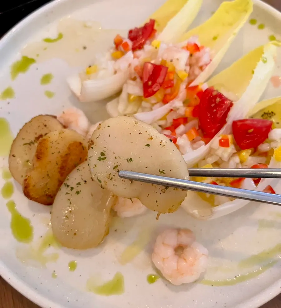 Grilled scallops served with blanched shrimp