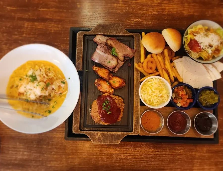 Table spread with the Texas Platter Set for two and shrimp cream pasta