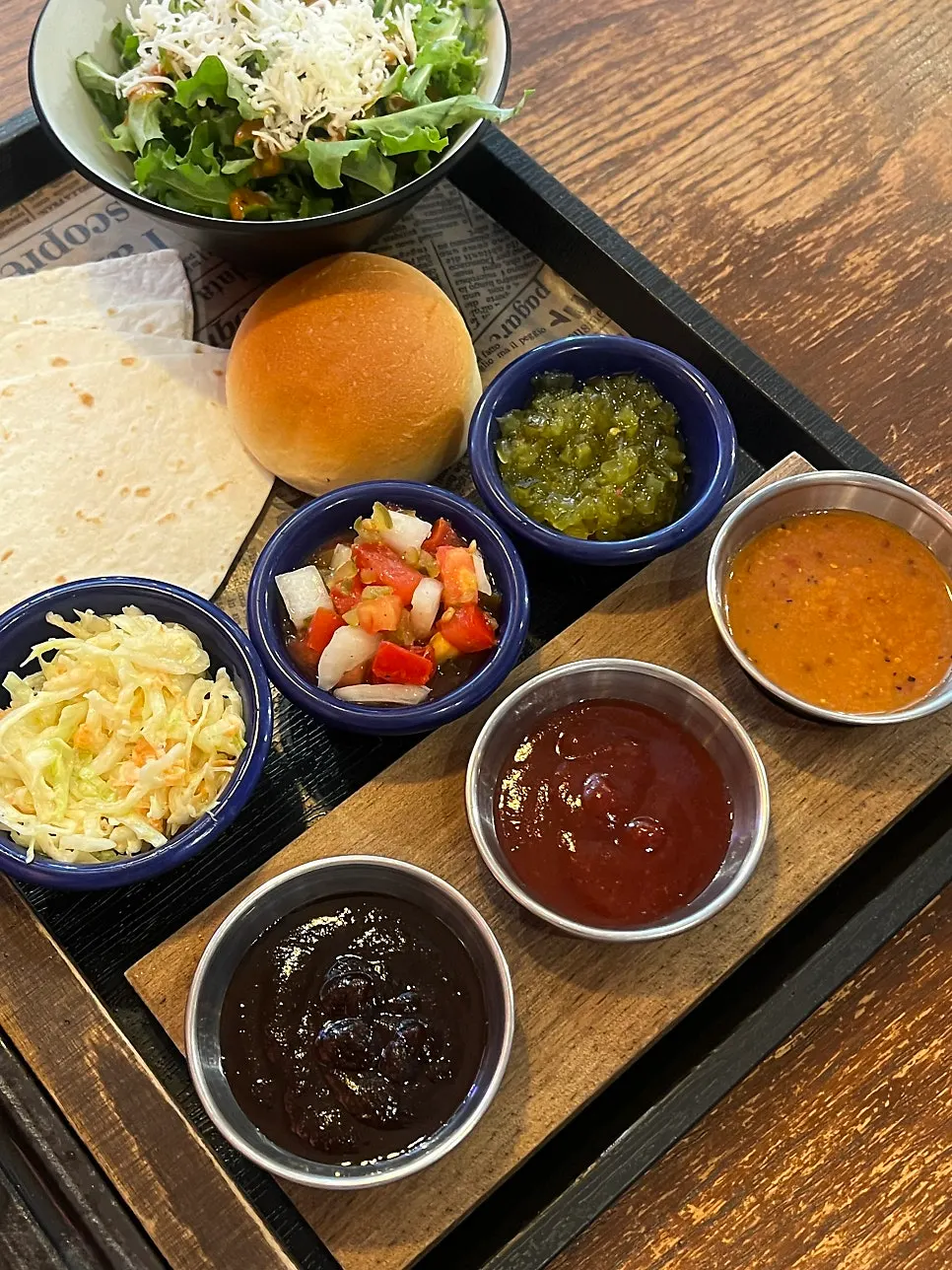 Coleslaw, pico de gallo, and three sauces on the side
