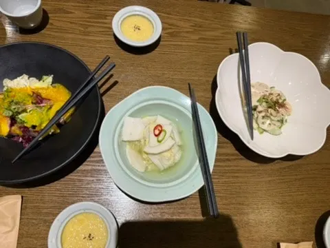 Table set with the bori-gulbi set meal and bulgogi together