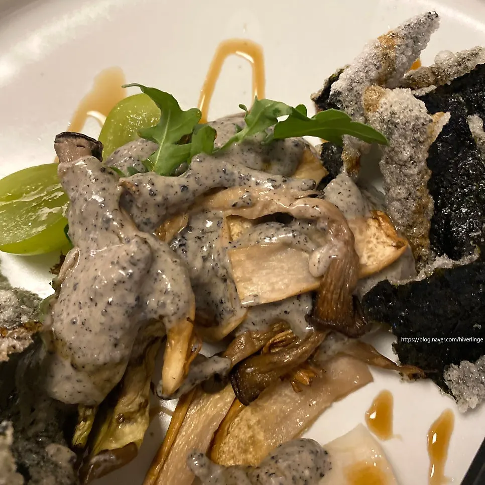 Close-up of eggplant dish with melon and Shine Muscat grapes