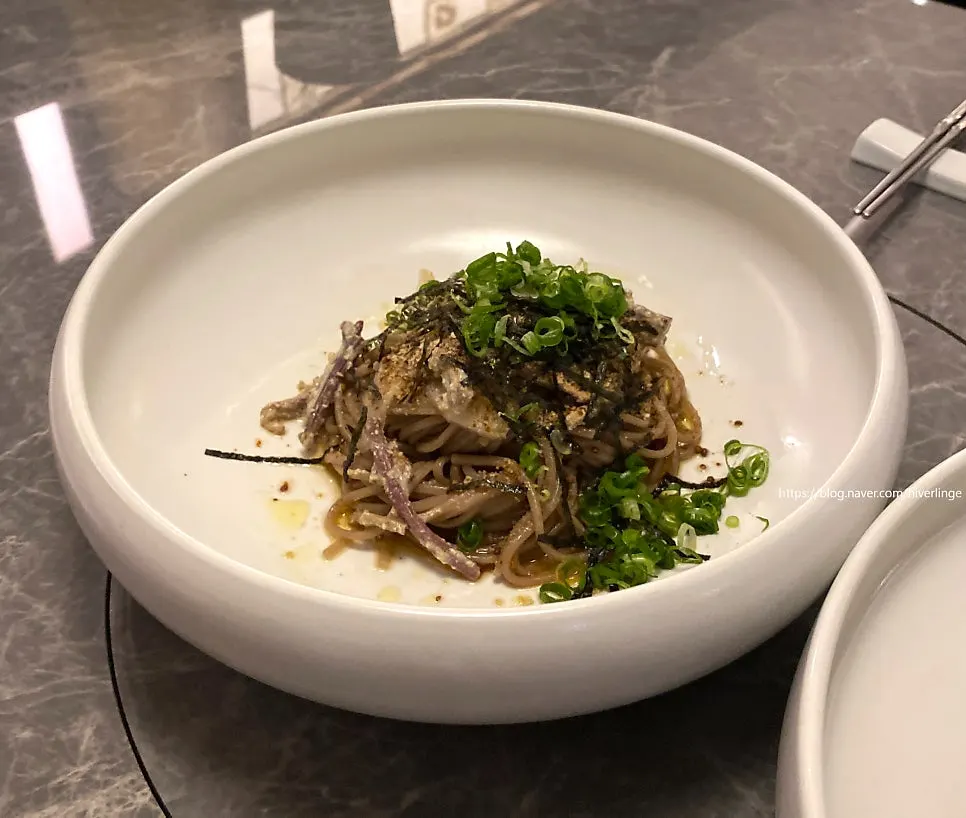 Perilla oil buckwheat noodles topped with bracken fern