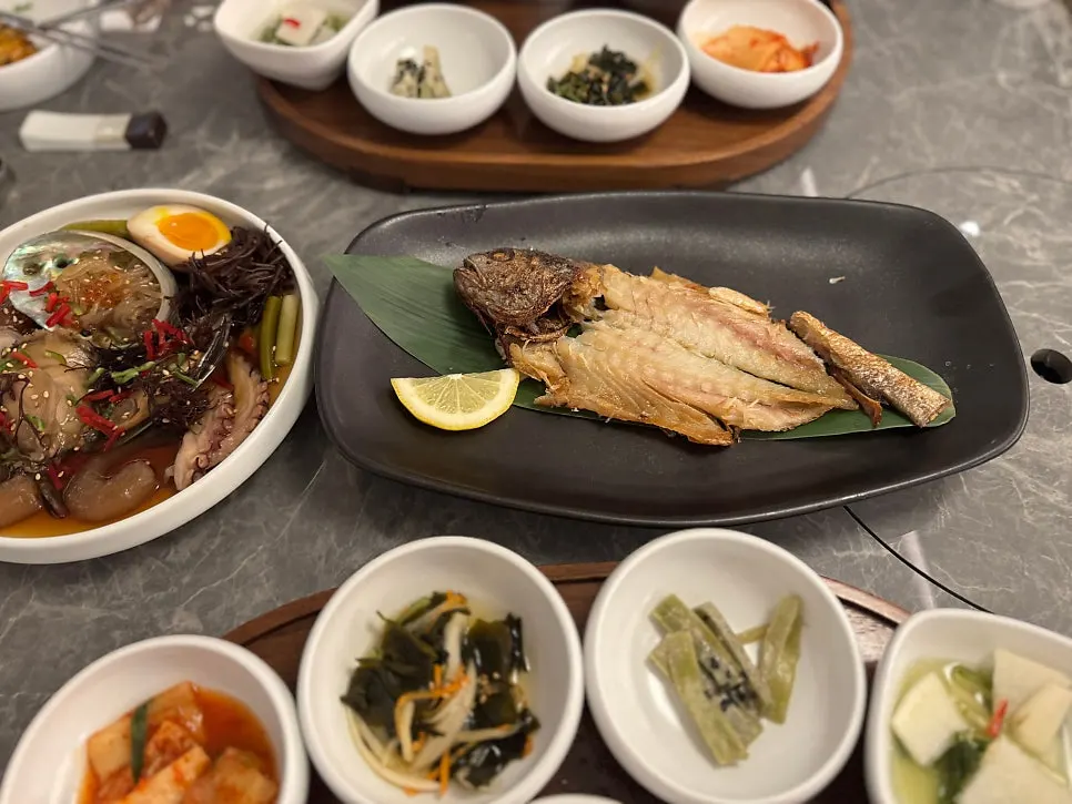 Two main set meals served on wooden trays