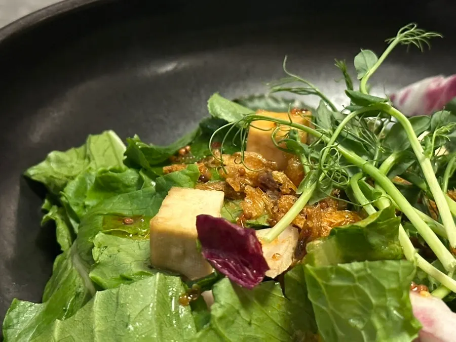 Close-up of the mustard seed dressing salad