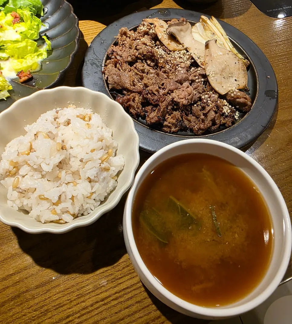 A full spread of smoky charcoal-grilled bulgogi at Modam Urban
