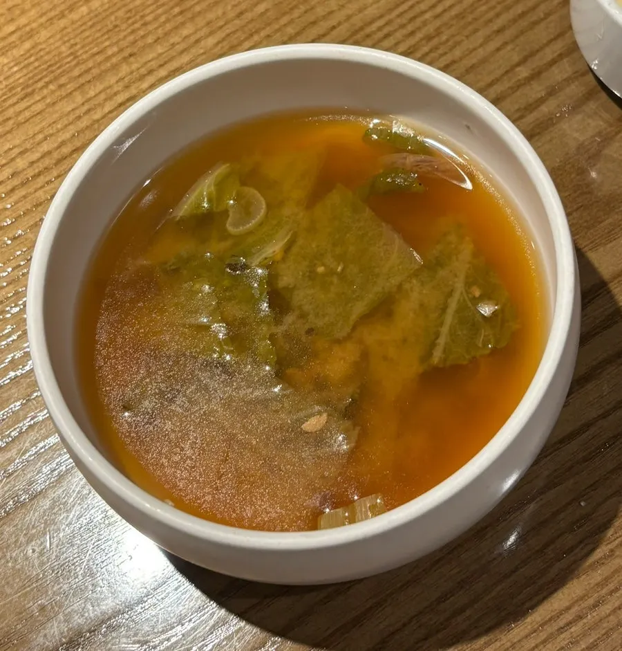 Table setting served with doenjang soup and aged kimchi