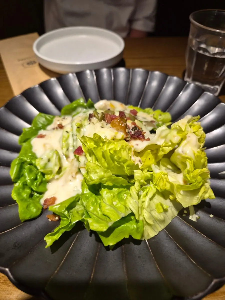 Appetizers being set out on the table at Modam Urban