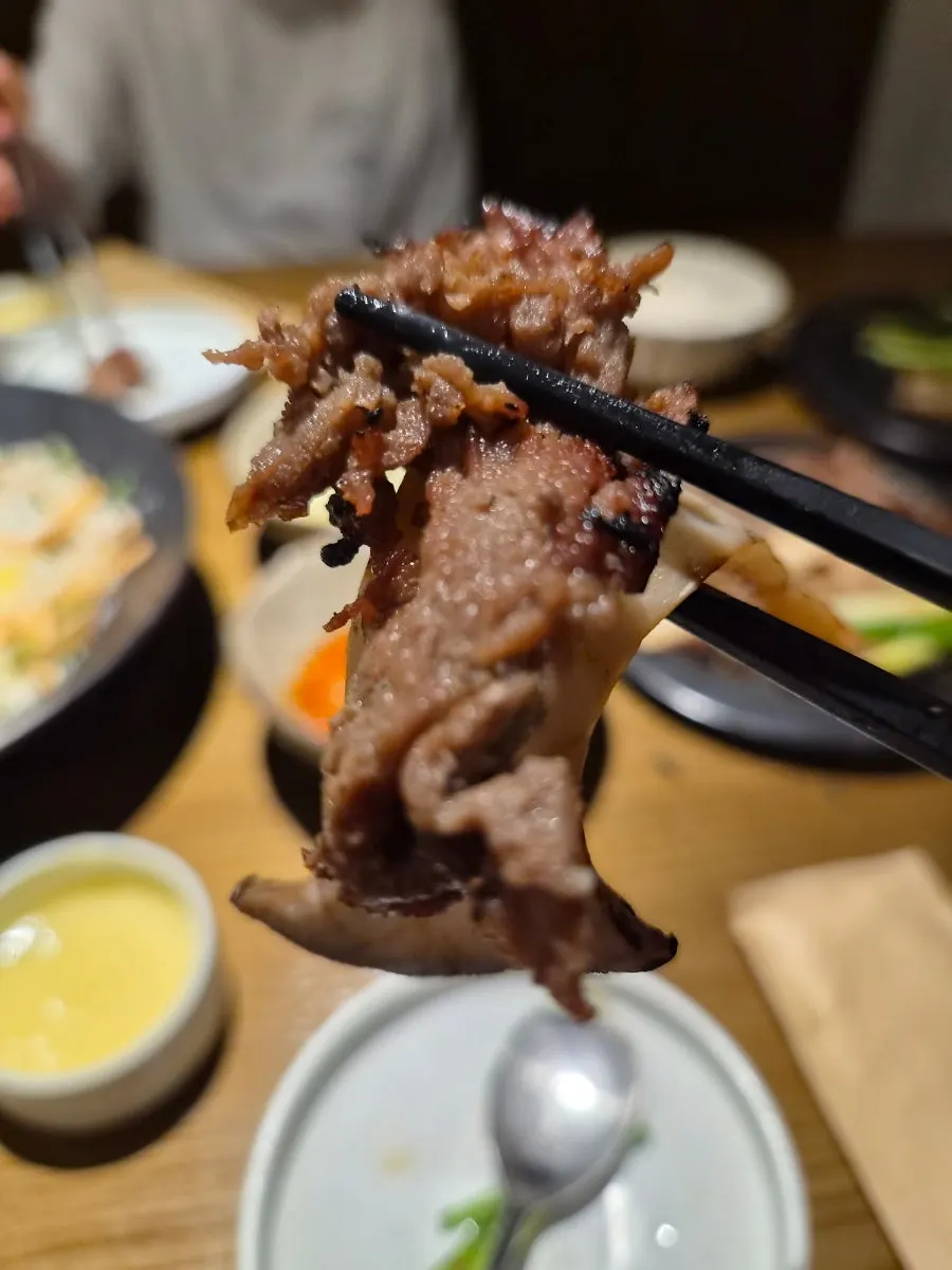 A plate of bulgogi eaten with rice