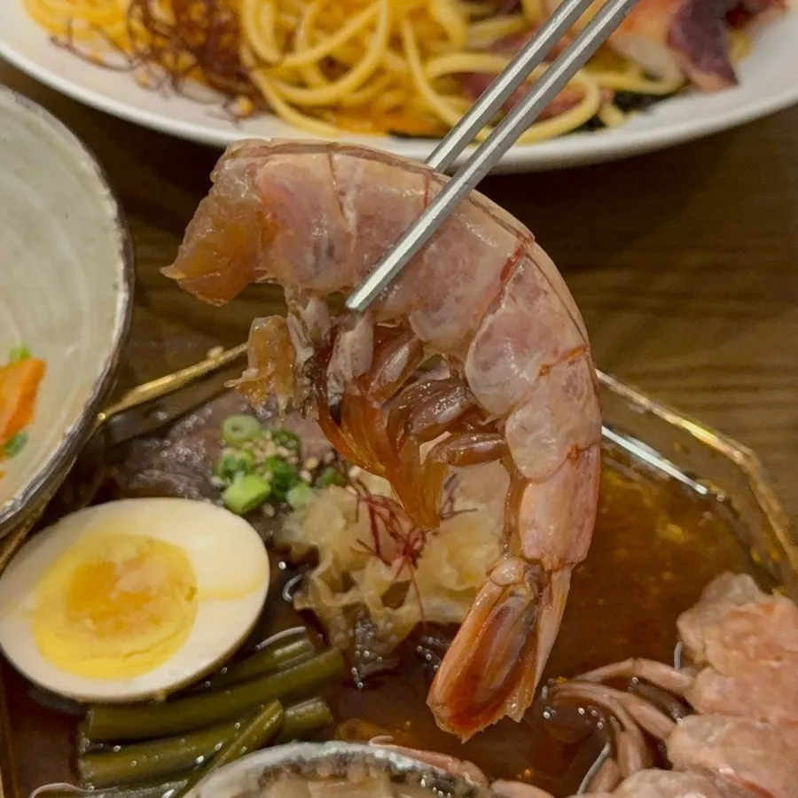 Warm soup served alongside the seafood jang meal