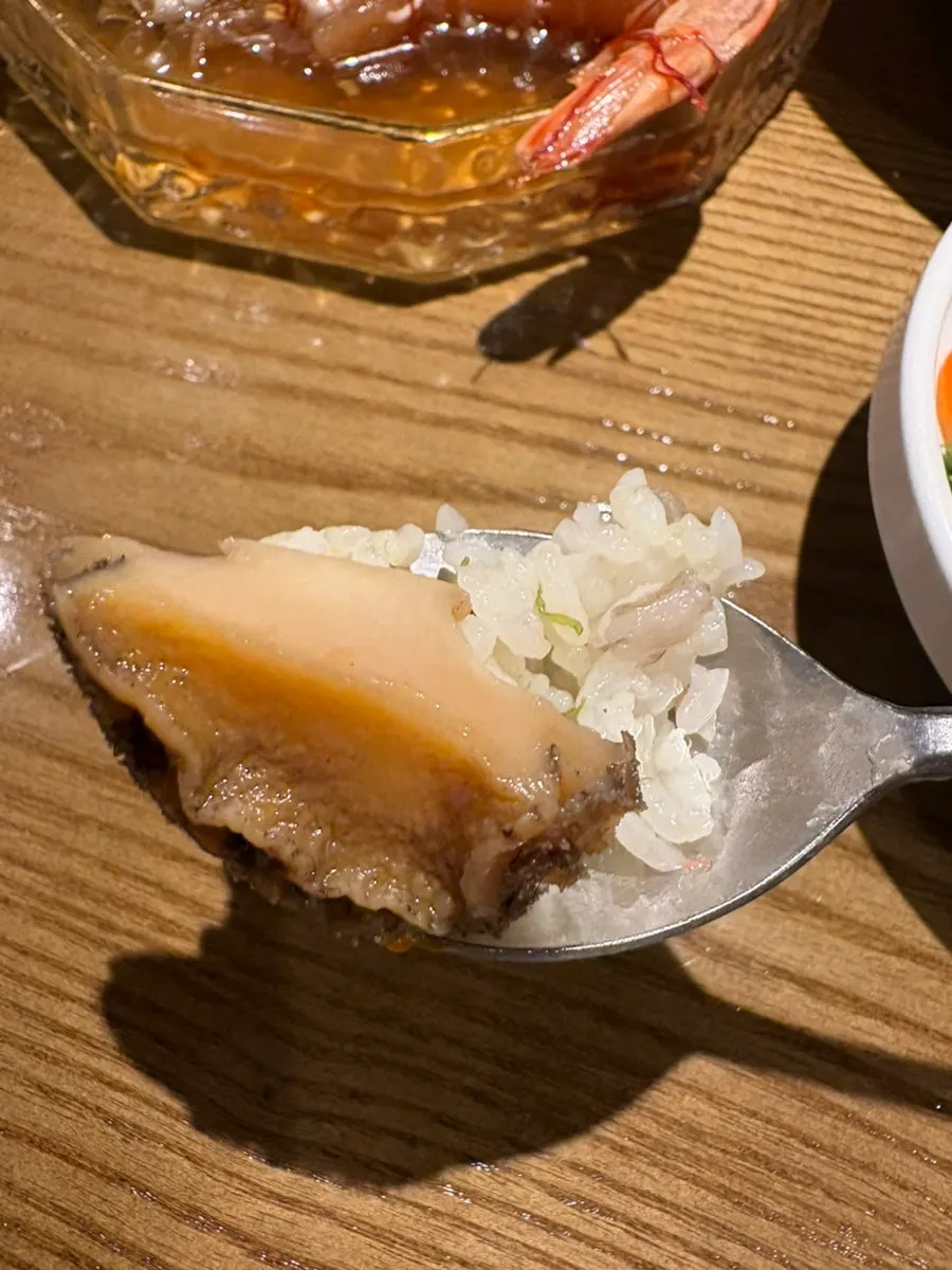 A spoonful of gim butter rice with seafood jang
