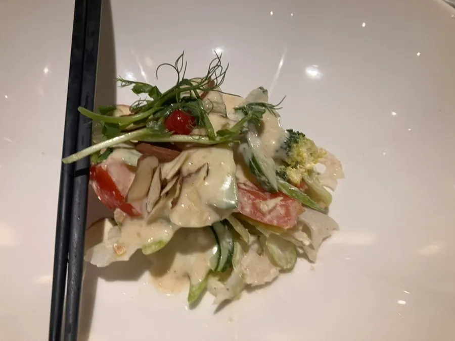 Mustard greens salad with pine nut sauce