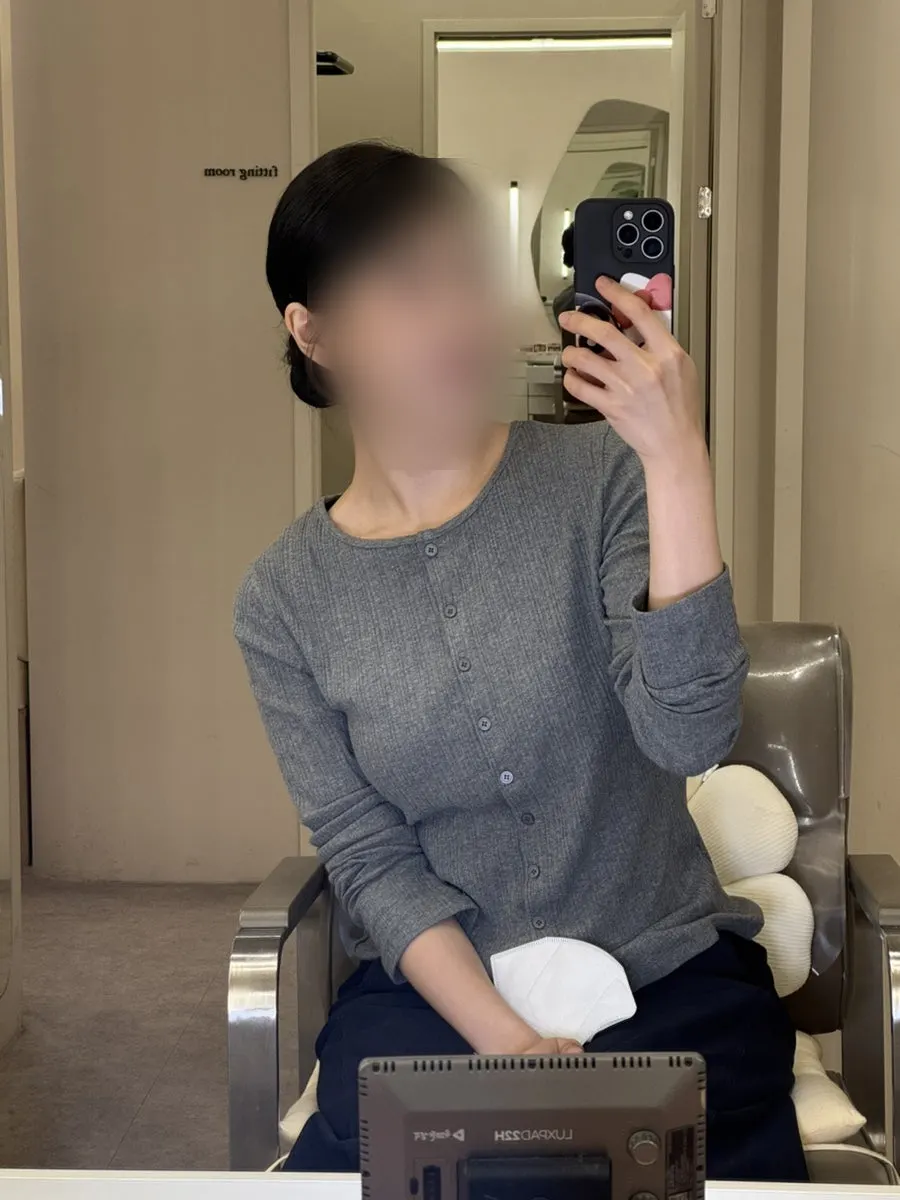 The mirror and neatly arranged cosmetics in the makeup area