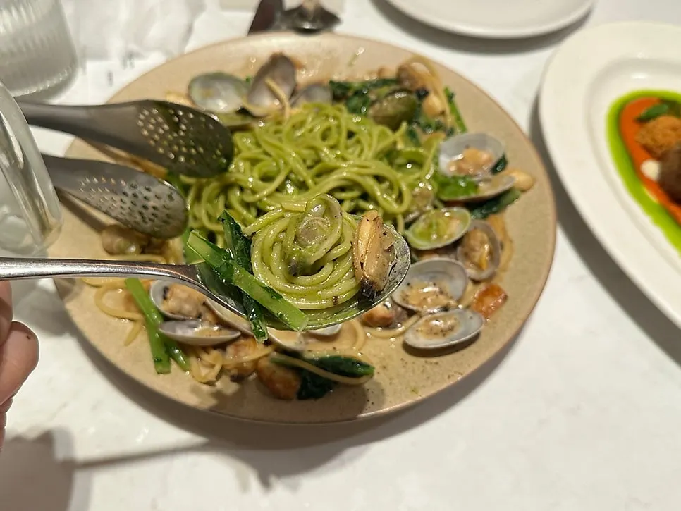 Close-up of vongole pasta with yeolmu mixed in