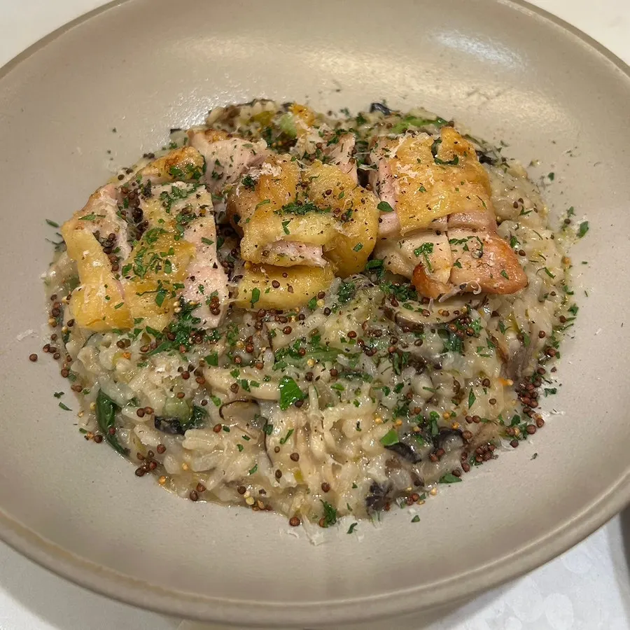 A plate of chicken mushroom risotto