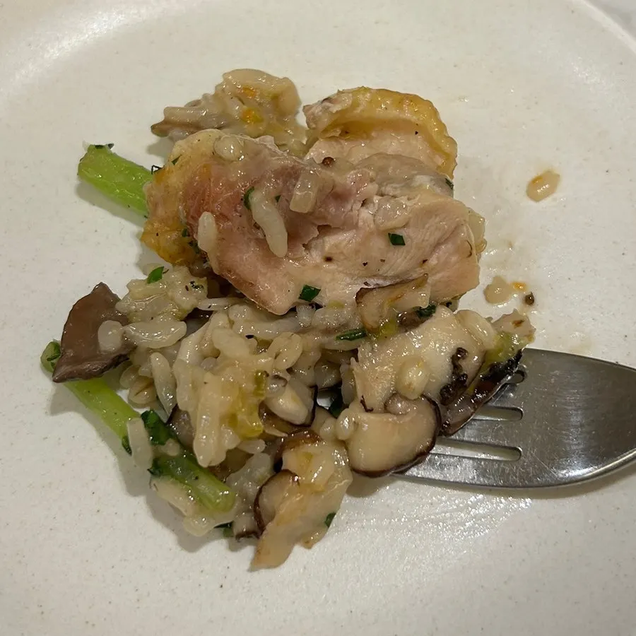 Grilled chicken thigh topping on the risotto