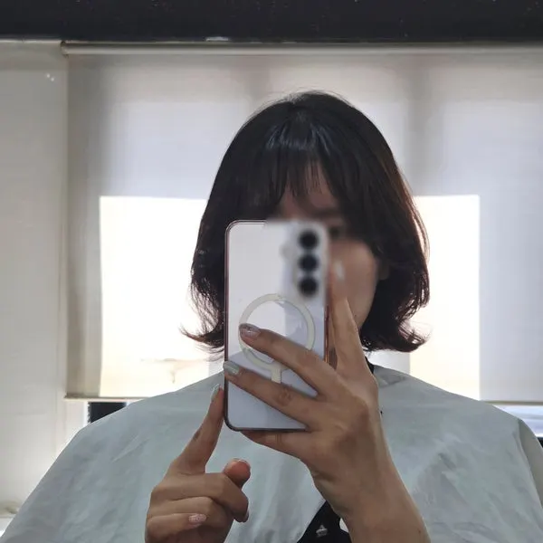 볼륨이 살아난 단발 레이어드 펌 스타일링