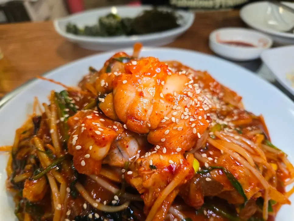 A piece of angler fish coated in sauce