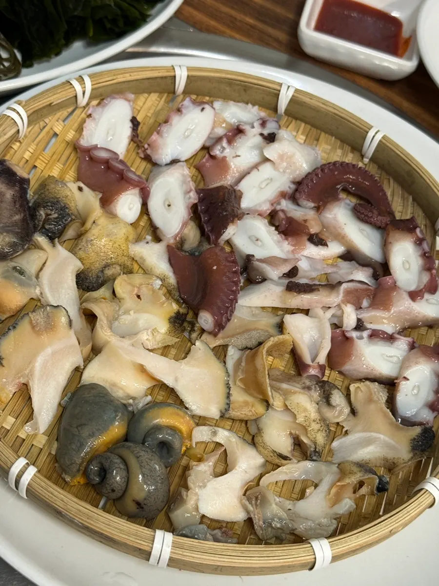 Boiled whelk on a plate