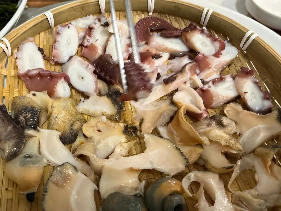 Picking up a piece of whelk