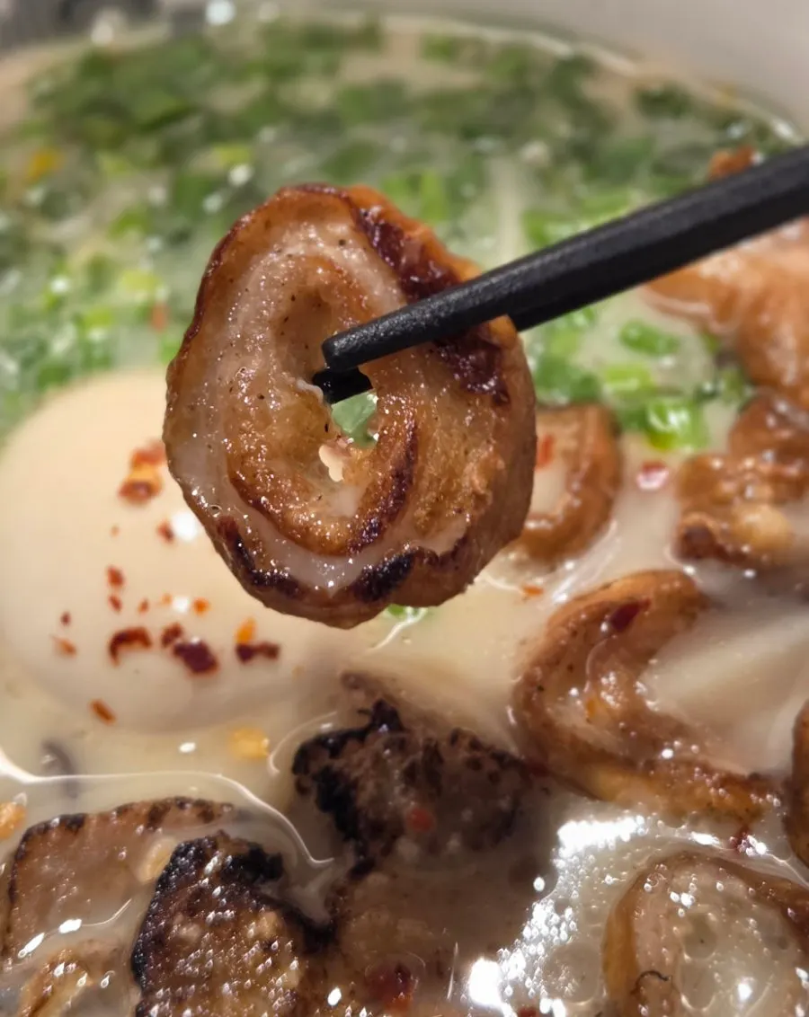 Motsu ramen topped with fried pork intestine