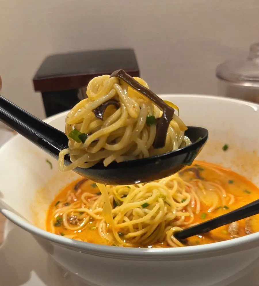 Motsu ramen with spicy seasoning added
